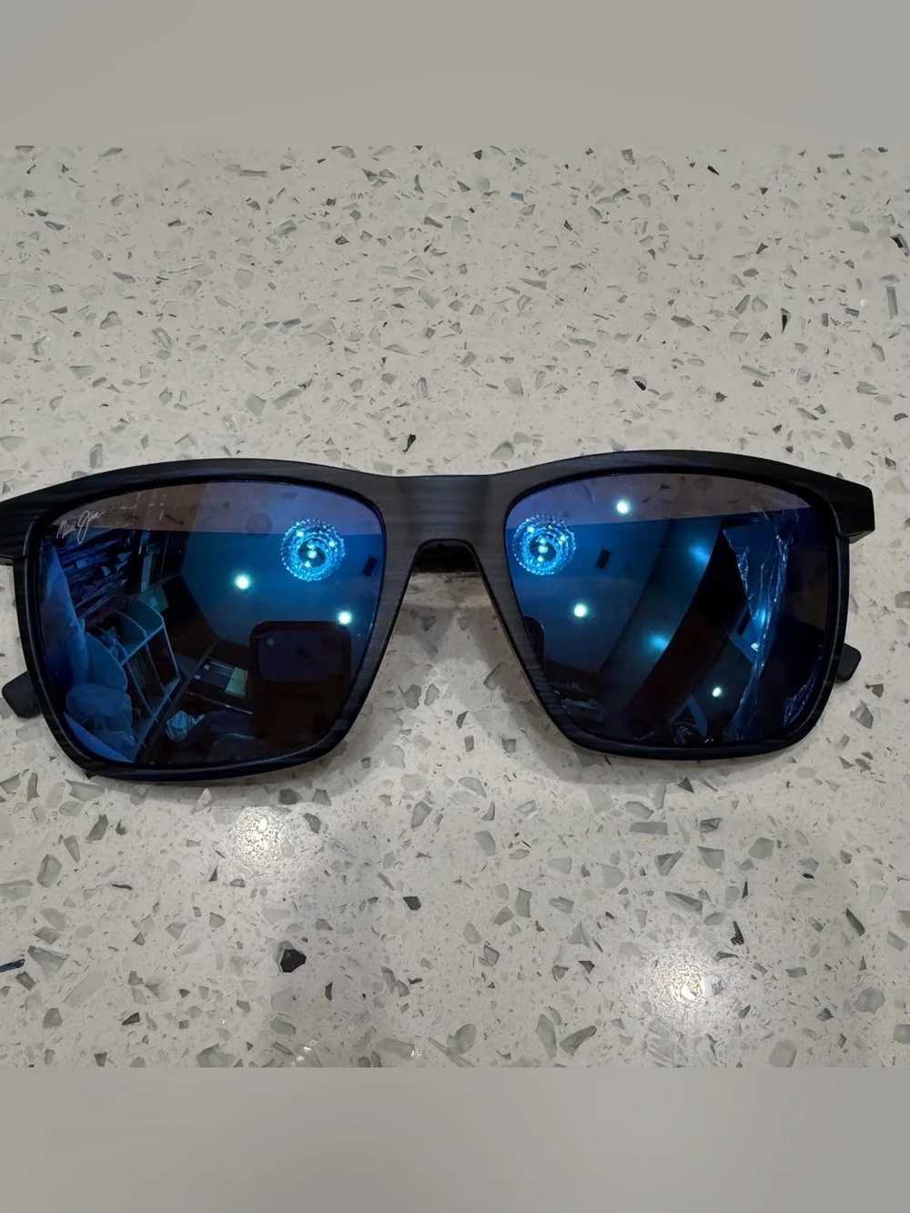 Maui Jim Black Frame Sunglasses with Blue Mirrored Lenses